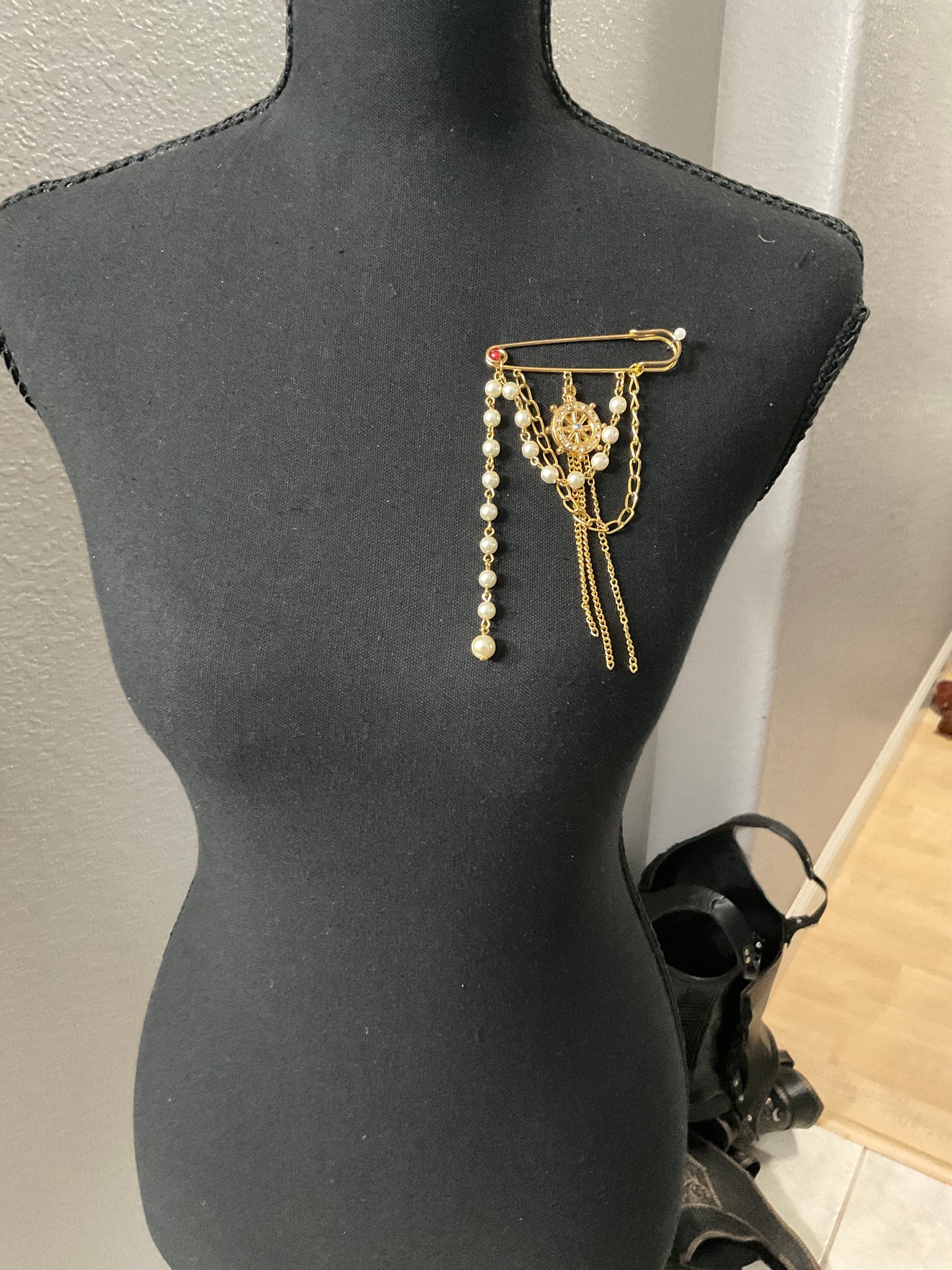 Gold Ship Wheel Brooch