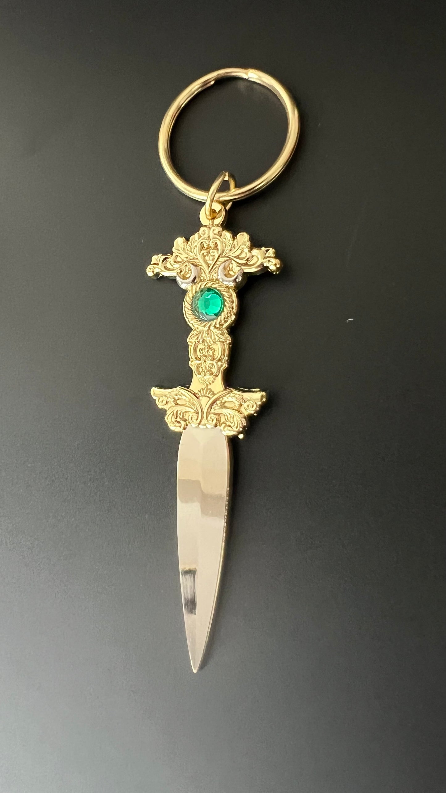 The Sorceress brass keychain