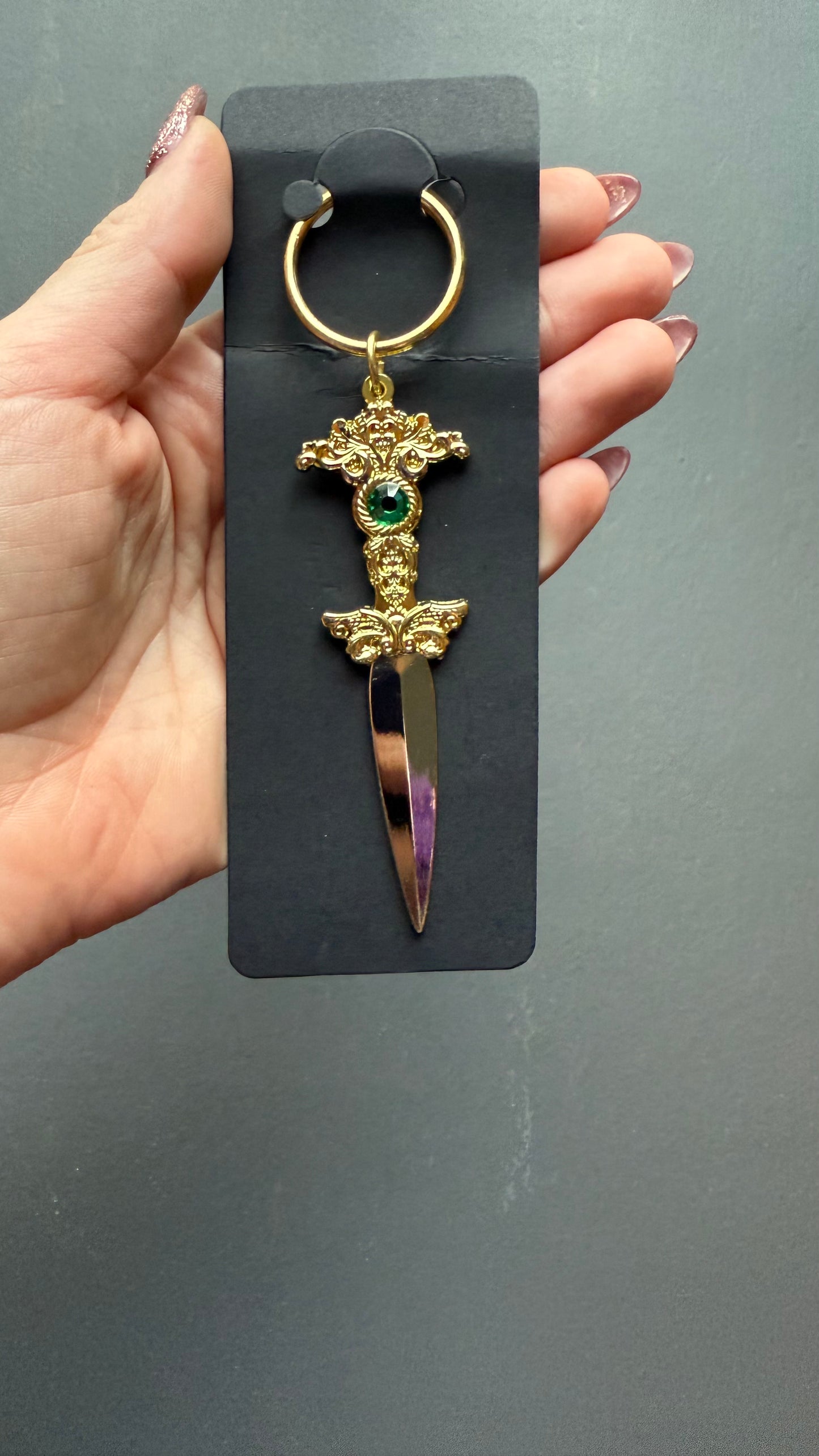 The Sorceress brass keychain