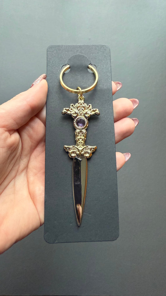 The Sorceress bronze with purple crystal keychain